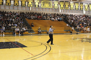 Principal Ron Okamura addresses the students at the Welcome Back Assembly.