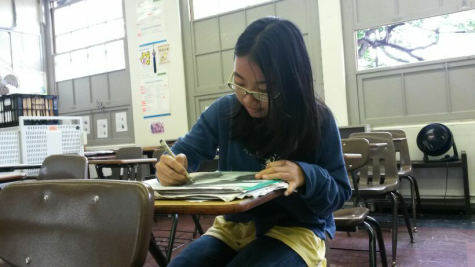 Sherry Lu working on a drawing.