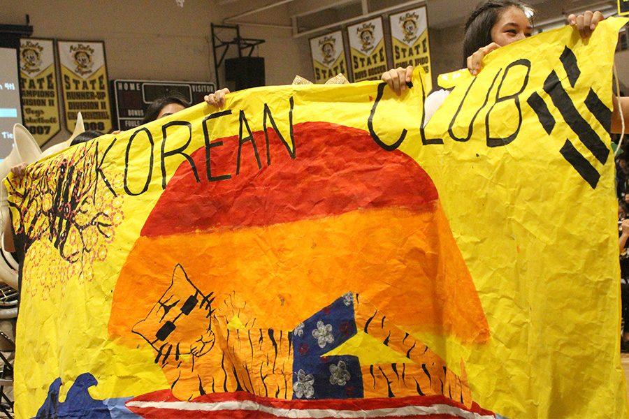 Korean club feature their banner in front of the court.