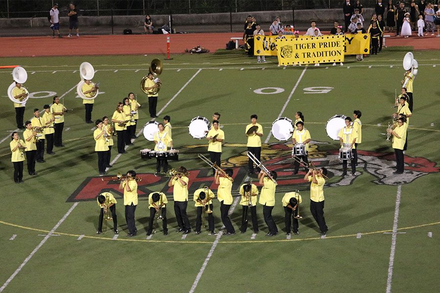 The MHS Bands trombone section perform a special routine at the game.