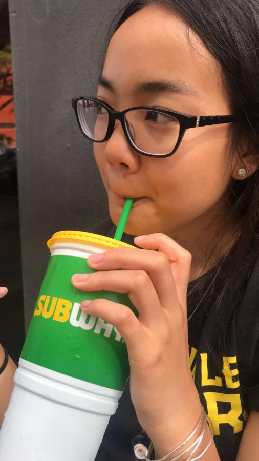 Erica Thongkam 9th grader sipping through subway plastic straws. If its not deposed of properly its going to harm the sea creatures.