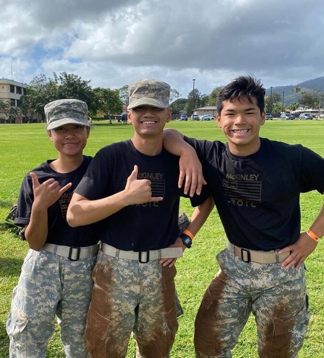 From Left - (Status of SY 2019-20) senior Jianne Miles, sophomore Eugene Asis, freshman Bruce Sipelii mug for the camera after getting dirty during 2020 Warrior Recon Challenge before the pandemic worsened.
