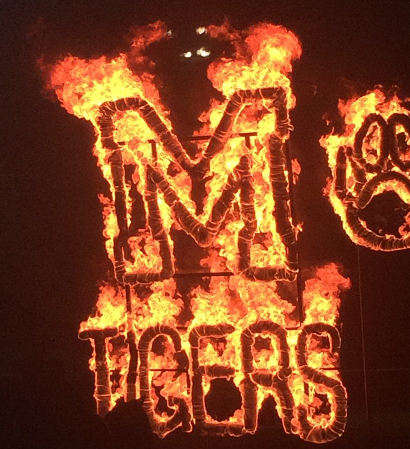 Traditional Lighting of the M burns brightly in the night after all the entertainment and events.