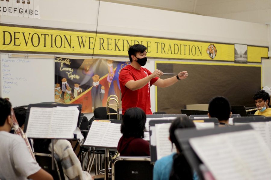Joseph Nakamoto directs the band during a sectional practice after school. 