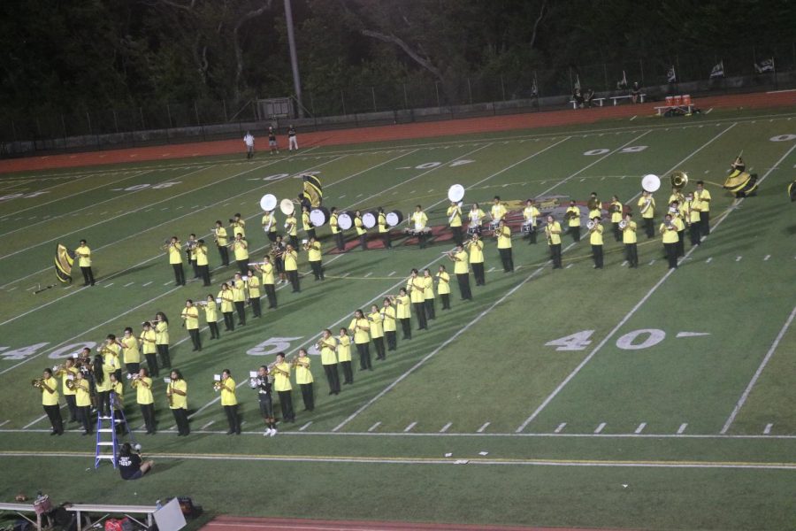 McKinleys band and color guard performs their first halftime show since the 1970s.