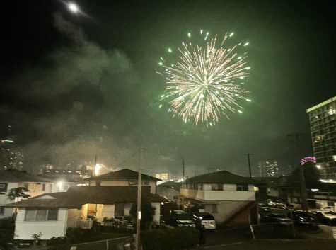 A firework sparkle lit to celebrate the new year, 2023 in Kapahulu.
