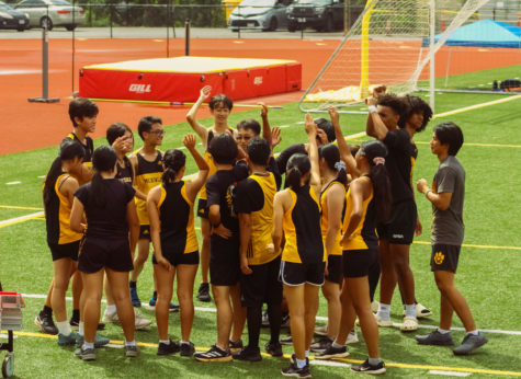 The McKinley Track and Field team during their first qualifying meet at Roosevelt High School.