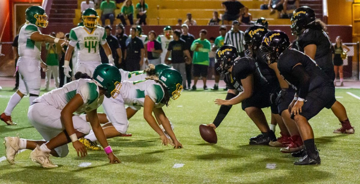 McKinley’s offensive line prepares for a play in the fourth quarter, setting the stage for quarterback Alyza Taufa’s 12-yard winning touchdown run.


