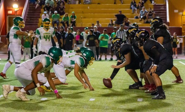 McKinley’s offensive line prepares for a play in the fourth quarter, setting the stage for quarterback Alyza Taufa’s 12-yard winning touchdown run.


