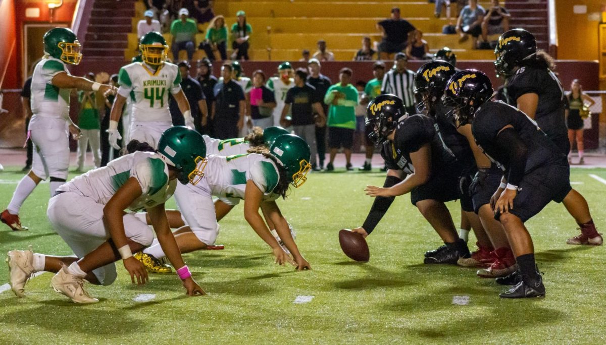 McKinley’s offensive line prepares for a play in the fourth quarter, setting the stage for quarterback Alyza Taufa’s 12-yard winning touchdown run.


