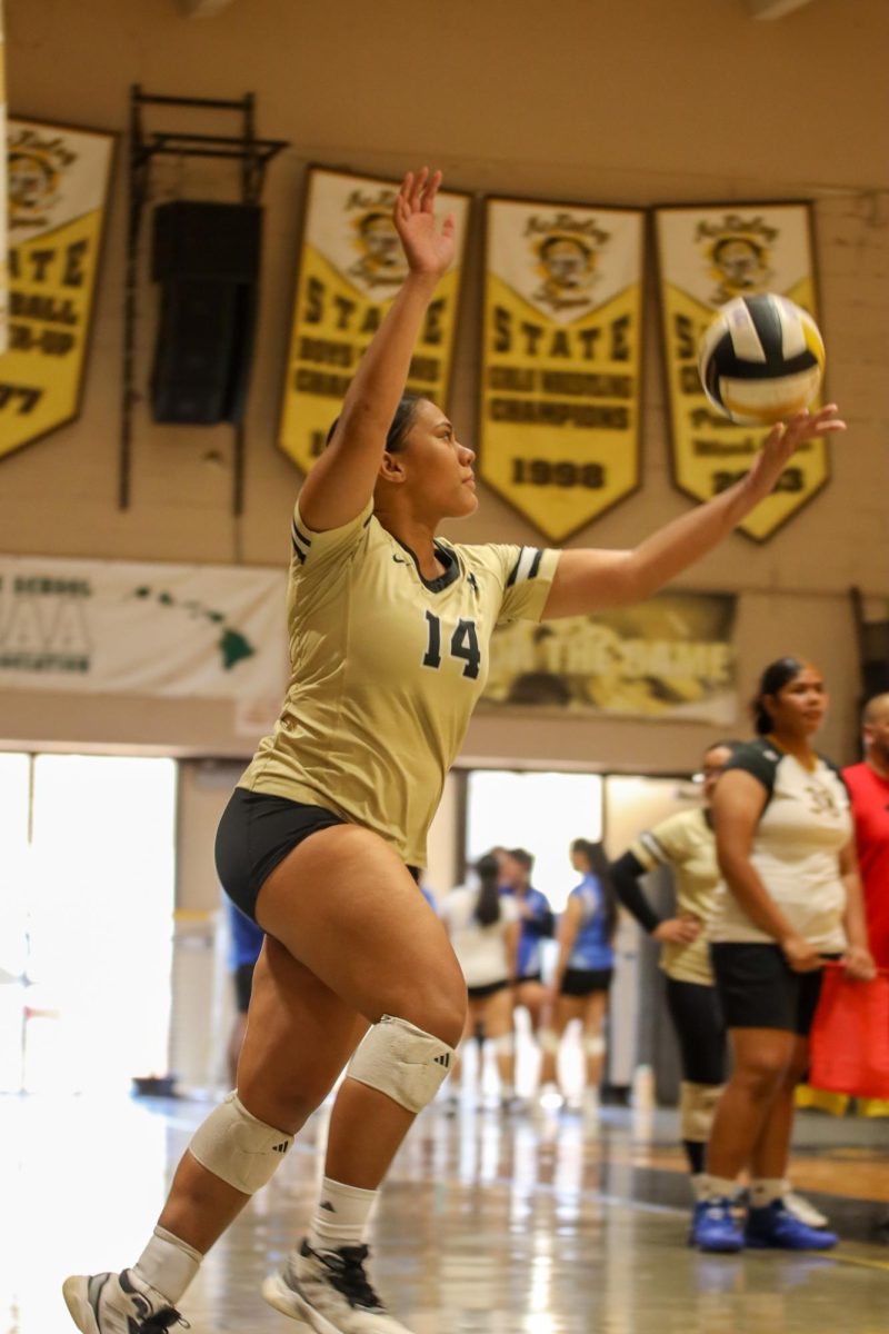 Ajae Baldomero (c/o ’26) serves during a match at the Black and Gold Tournament. Photo by: Javis Phan (c/o '28)