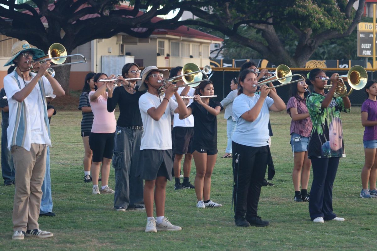 The McKinley Marching Band rehearsing for the homecoming show. 