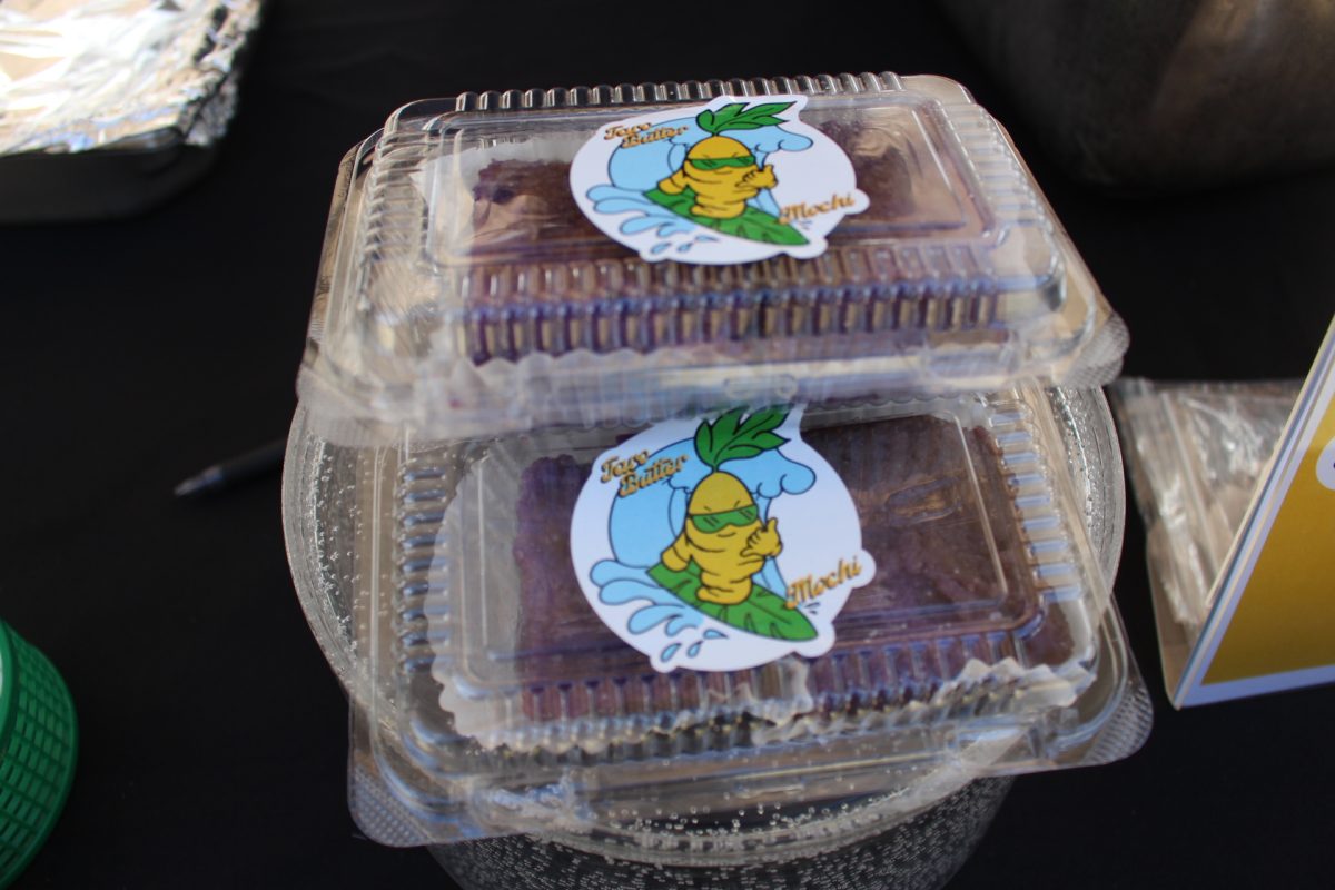 Packages of 2 pieces of taro butter mochi, which sold for $5 dollars each. People had an opportunity to try from the sample plate before buying. During the Winter Craft Fair Golden Roots sold out of the taro butter mochi.
Photo by Cheska Orias (c/o '26)