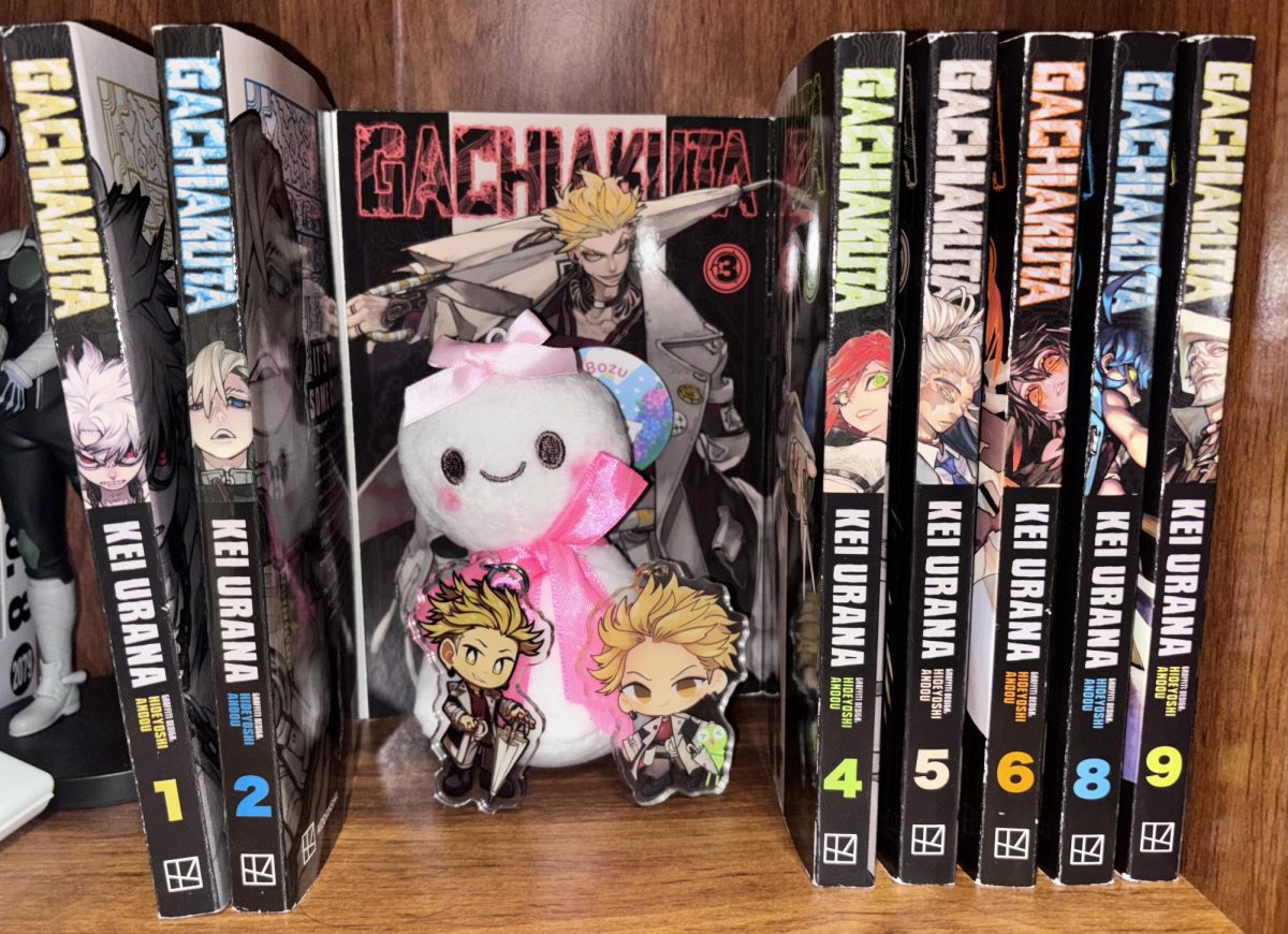 Orias's collection of Gachiakuta volumes one through nine. In the middle is one of the main side characters, Enjin, with a Teru Bozu plush and keychains of the character.
Photo by Cheska Orias.